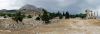 Corinth, Greece ~ panorama showing ruins of the Temple of Apollo and the acropolis where the temple to Aphrodite once stood