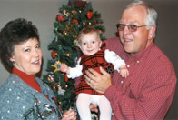 With our first grandchild, Audrey, November 2003